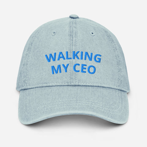 Light blue cap with text Walking my CEO and paw print logo on a white background